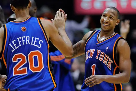 The Knicks' Chris Duhon, right, celebrates with Jared Jeffries 